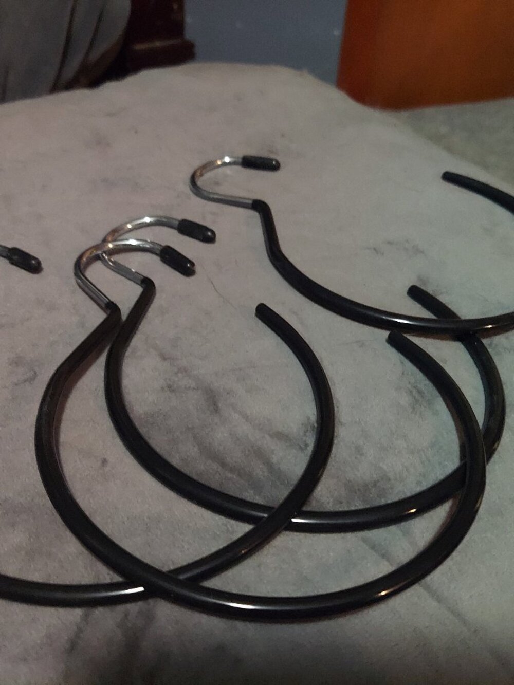 Hangers for belts, scarves, purses, Also good for holding spools of craft suply